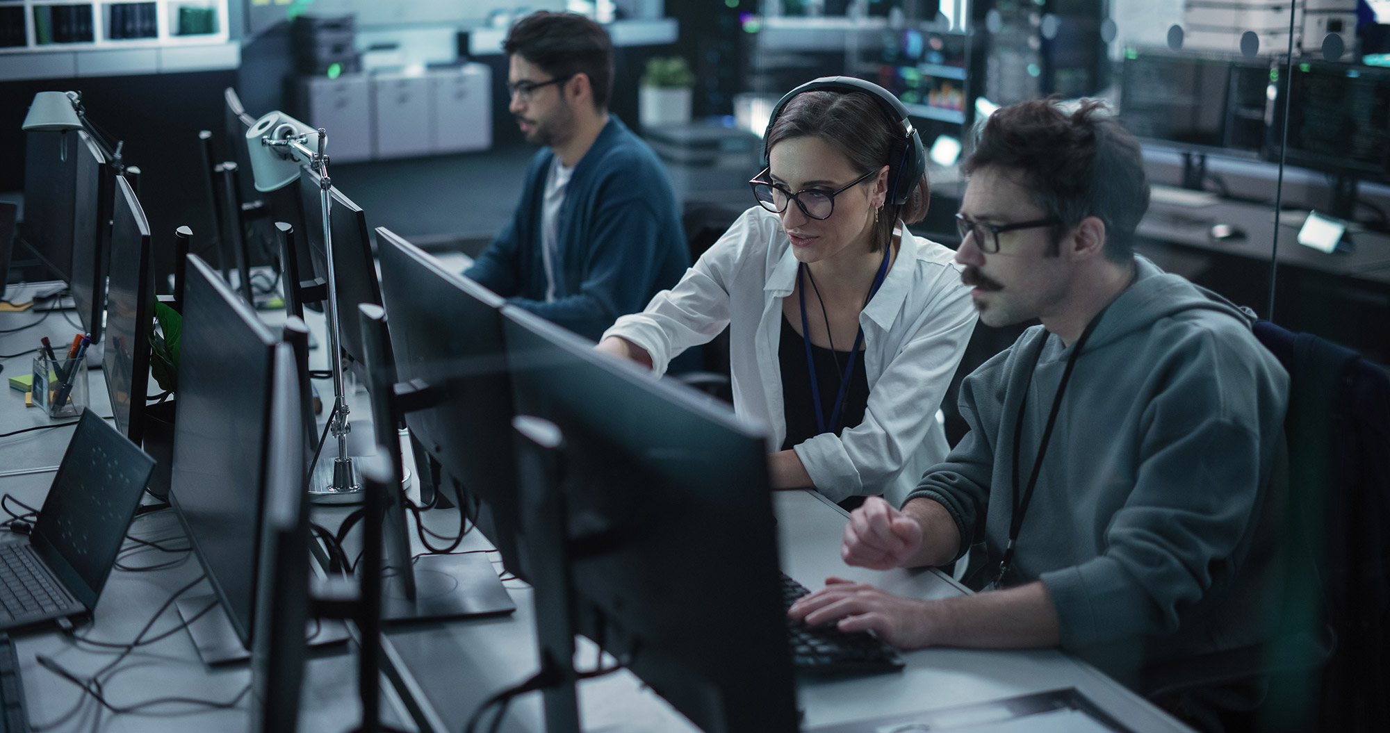 Web developers working on desktop computers.